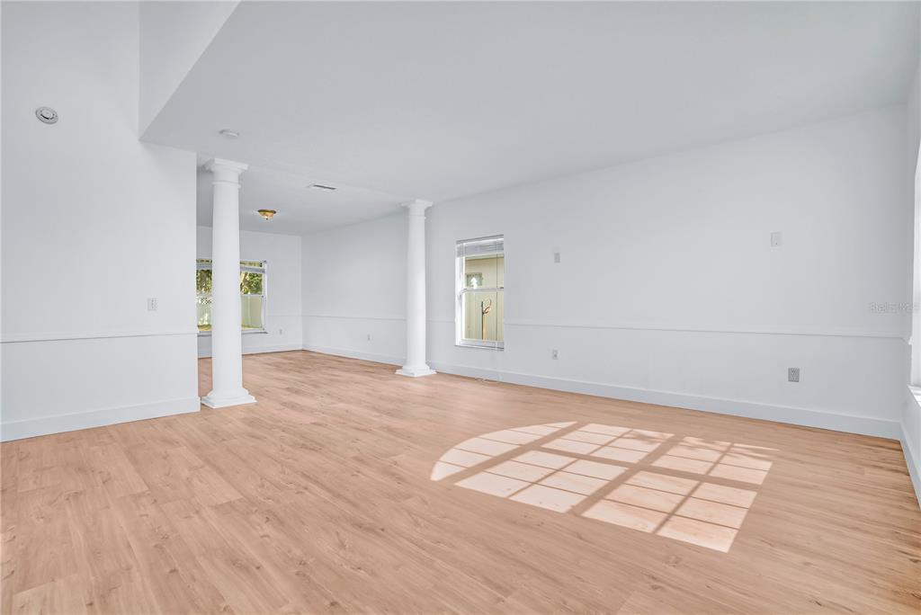 444 Acacia Tree Way Kissimmee, FL 34758 - Photo 17 of 38 wooden floor in an empty room