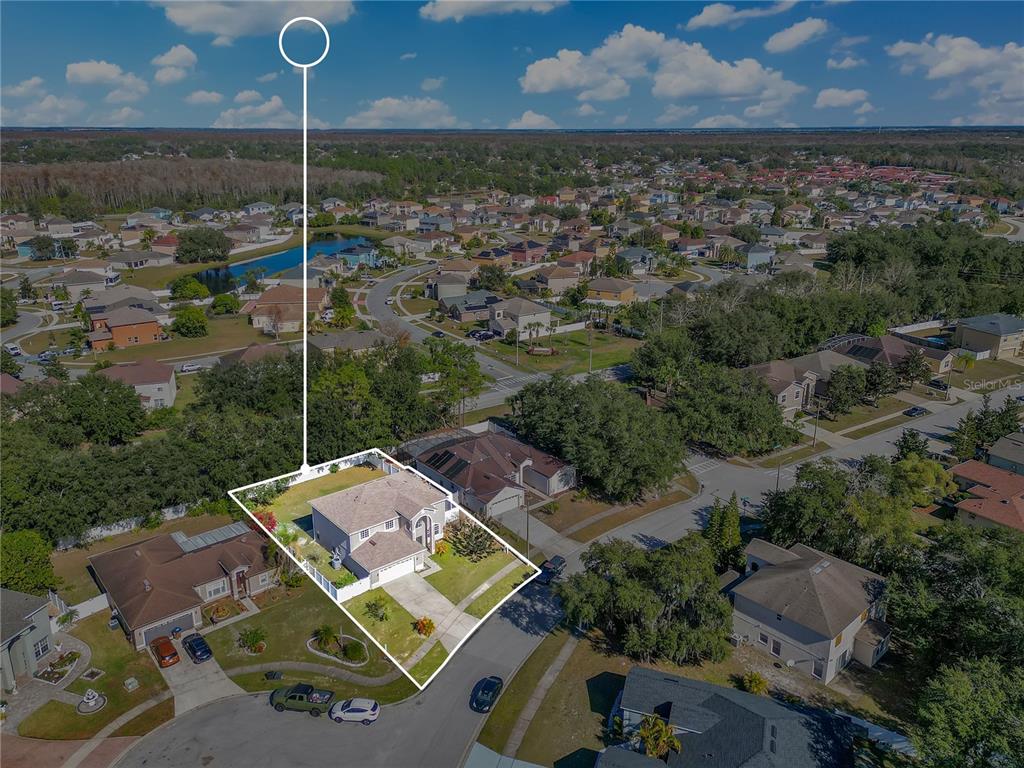 444 Acacia Tree Way Kissimmee, FL 34758 - Photo 38 of 38 an aerial view of residential house with outdoor space