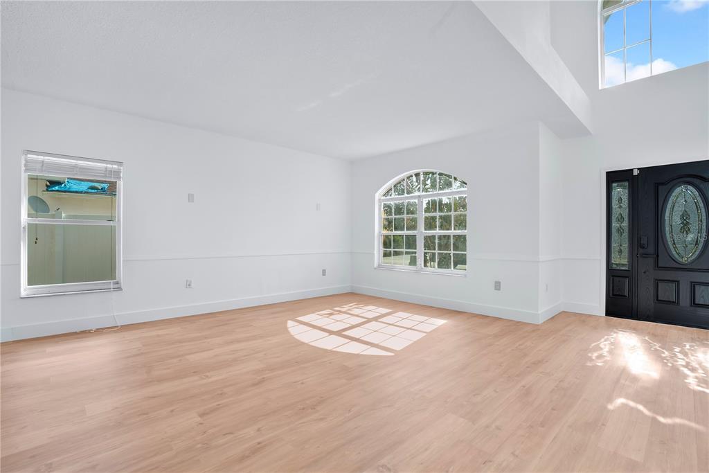 444 Acacia Tree Way Kissimmee, FL 34758 - Photo 5 of 38 a view of a livingroom with a window