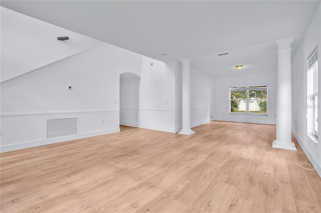 444 Acacia Tree Way Kissimmee, FL 34758 - Photo 7 of 38 a view of an empty room and window