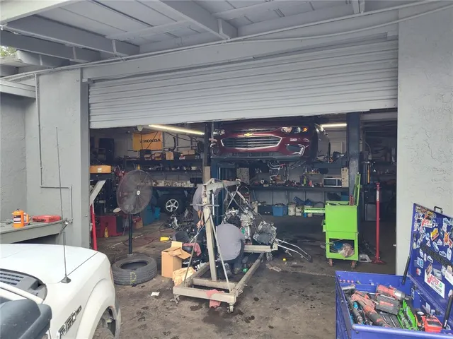 a view of gym equipment with a floor to ceiling window