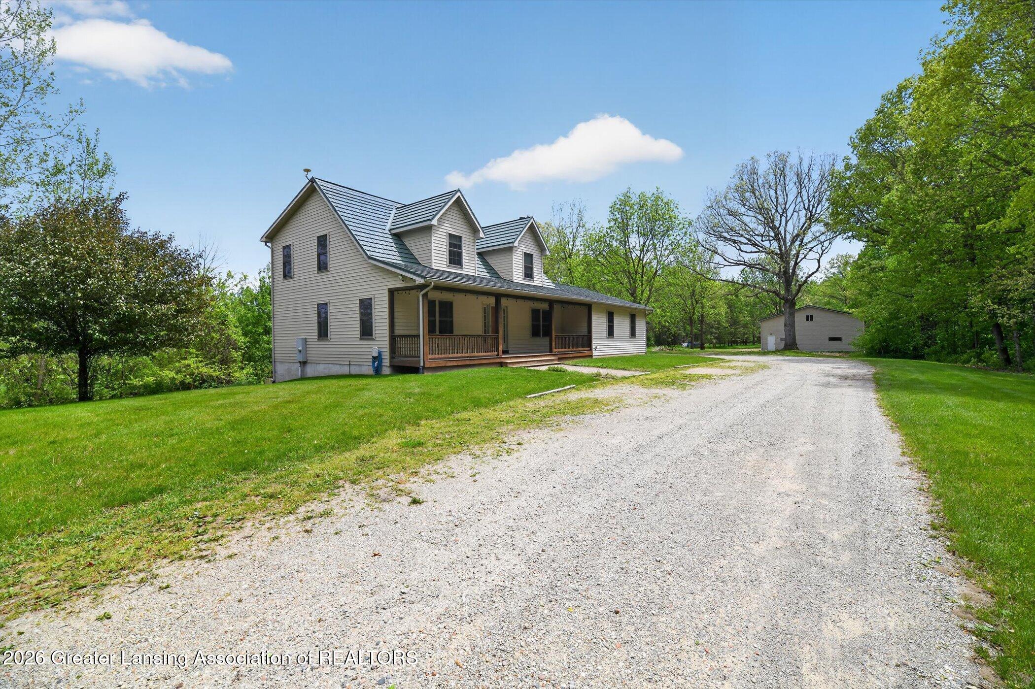 1300 East Round Lake Road Dewitt, MI 48820 - Photo 4 of 59 03-1300-E-Round-Lake-Rd-WindowStill-Phot