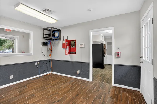a kitchen with stainless steel appliances granite countertop a stove and a refrigerator