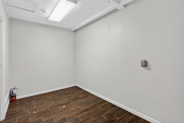 a bathroom with a sink a mirror and a shower