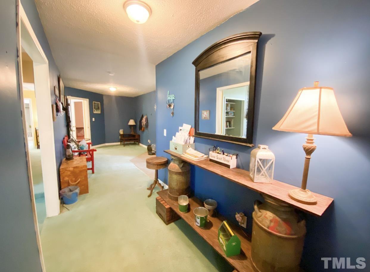 105 Lawson Farm Road Roxboro, NC 27574 - Photo 12 of 25 a living room with furniture and a window