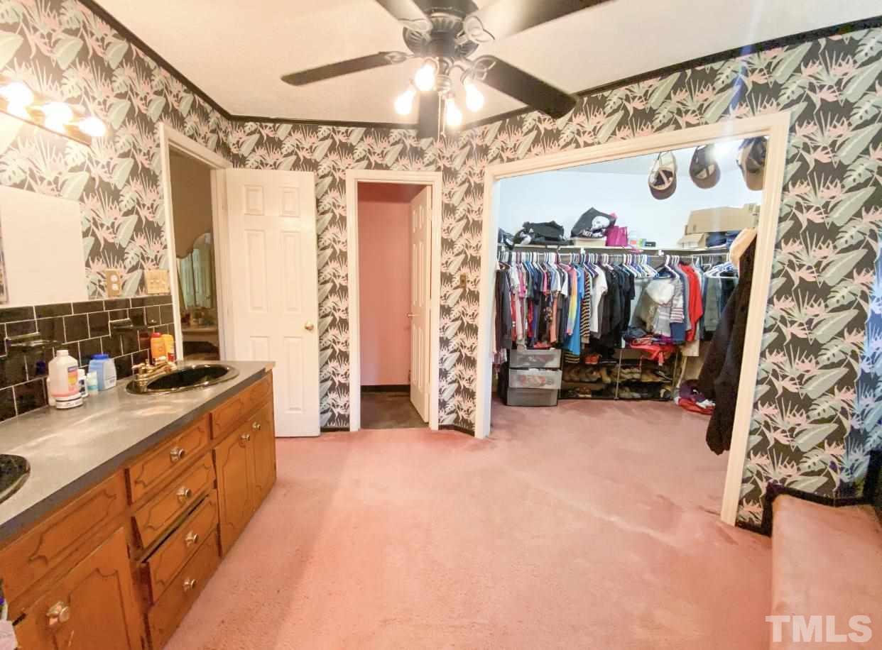 105 Lawson Farm Road Roxboro, NC 27574 - Photo 19 of 25 a view of a walk in closet