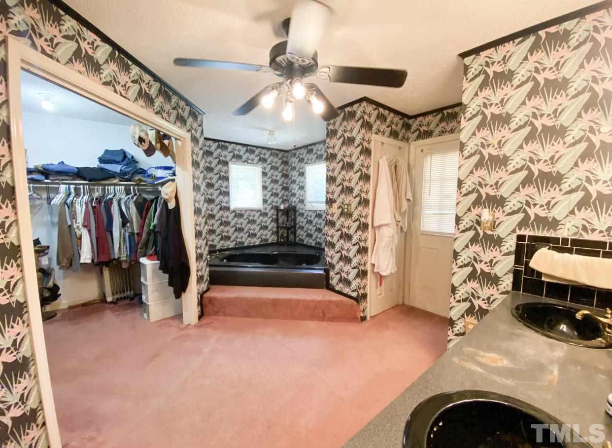 105 Lawson Farm Road Roxboro, NC 27574 - Photo 21 of 25 a view of livingroom with furniture and a fireplace