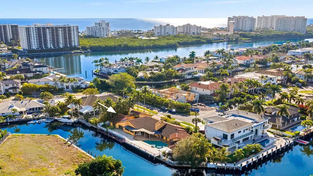 an aerial view of a house with a lake view