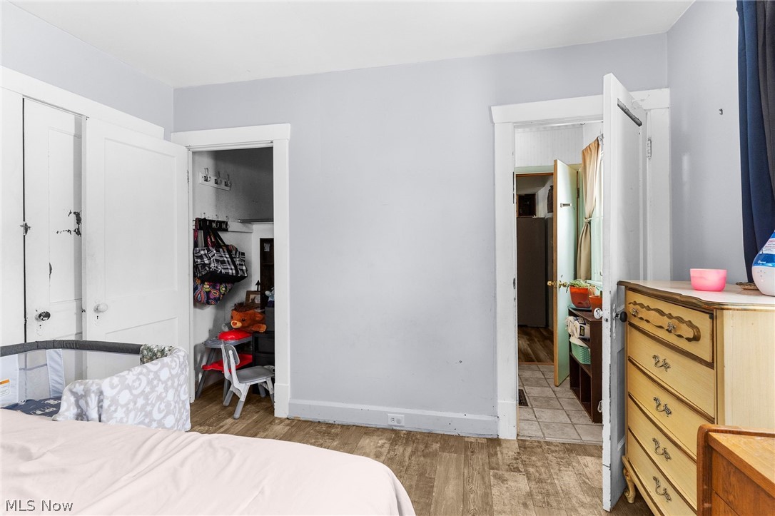 464 Elm Street Struthers, OH 44471 - Photo 22 of 22 Bedroom featuring light wood finished floors and a closet
