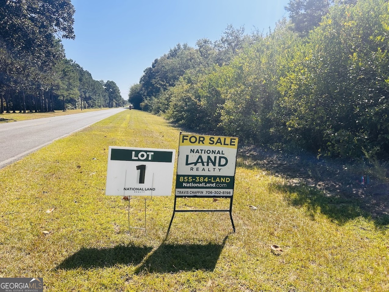 a view of a sign board with lake view