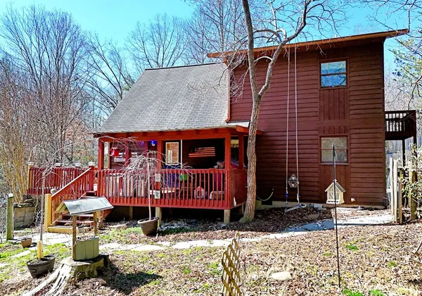 a front view of a house with garage