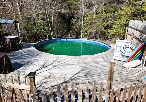 a view of outdoor space and swimming pool