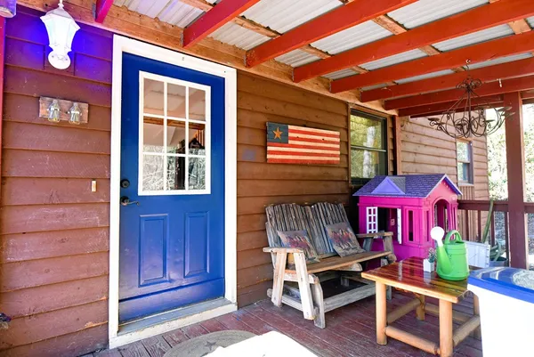 a front view of a house with a porch