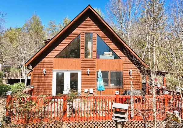 a view of a house with a roof deck
