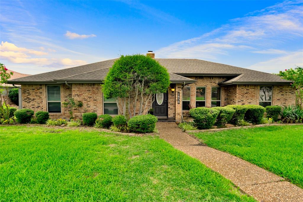 1638 Silverleaf Drive Carrollton, TX 75007 - Photo 1 of 1 a front view of a house with a yard