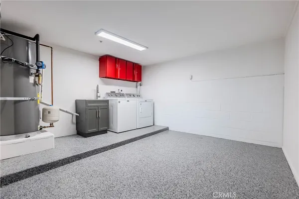 a room with furniture and a projector screen