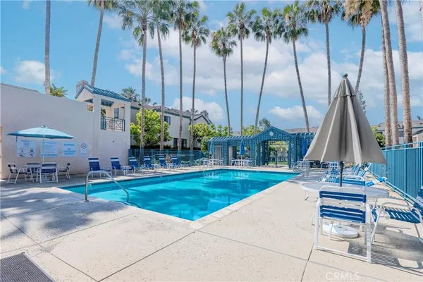 a view of a palm trees in front of a house