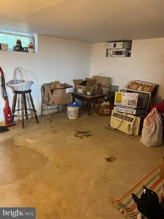 a room with furniture and a flat screen tv