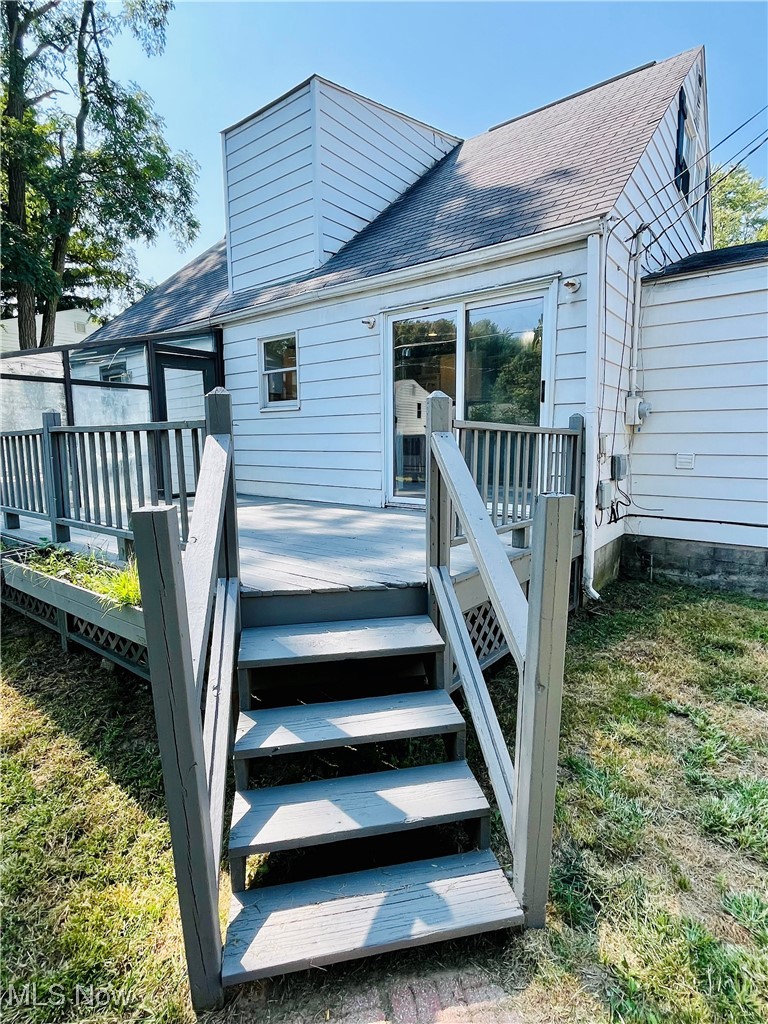 1747 Sterling Road Madison, OH 44057 - Photo 35 of 40 Back of property featuring a wooden deck