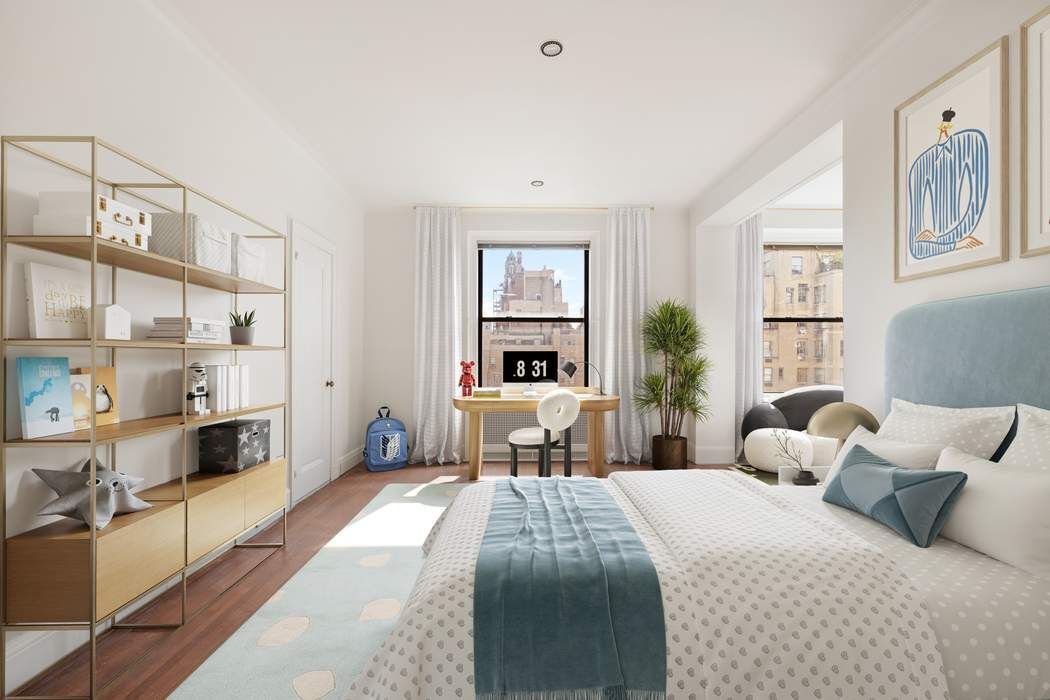 920 5th Avenue, Unit 10B Manhattan, NY 10021 - Photo 14 of 23 a bedroom with a large bed and a window