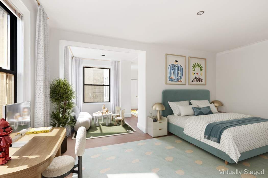 920 5th Avenue, Unit 10B Manhattan, NY 10021 - Photo 17 of 23 a bedroom with a bed couch and window