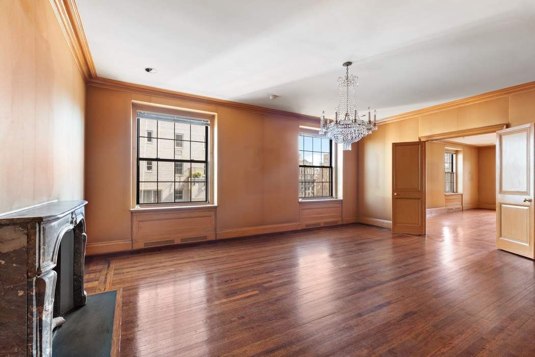 920 5th Avenue, Unit 10B Manhattan, NY 10021 - Photo 9 of 23 a view of livingroom with hardwood floor and window