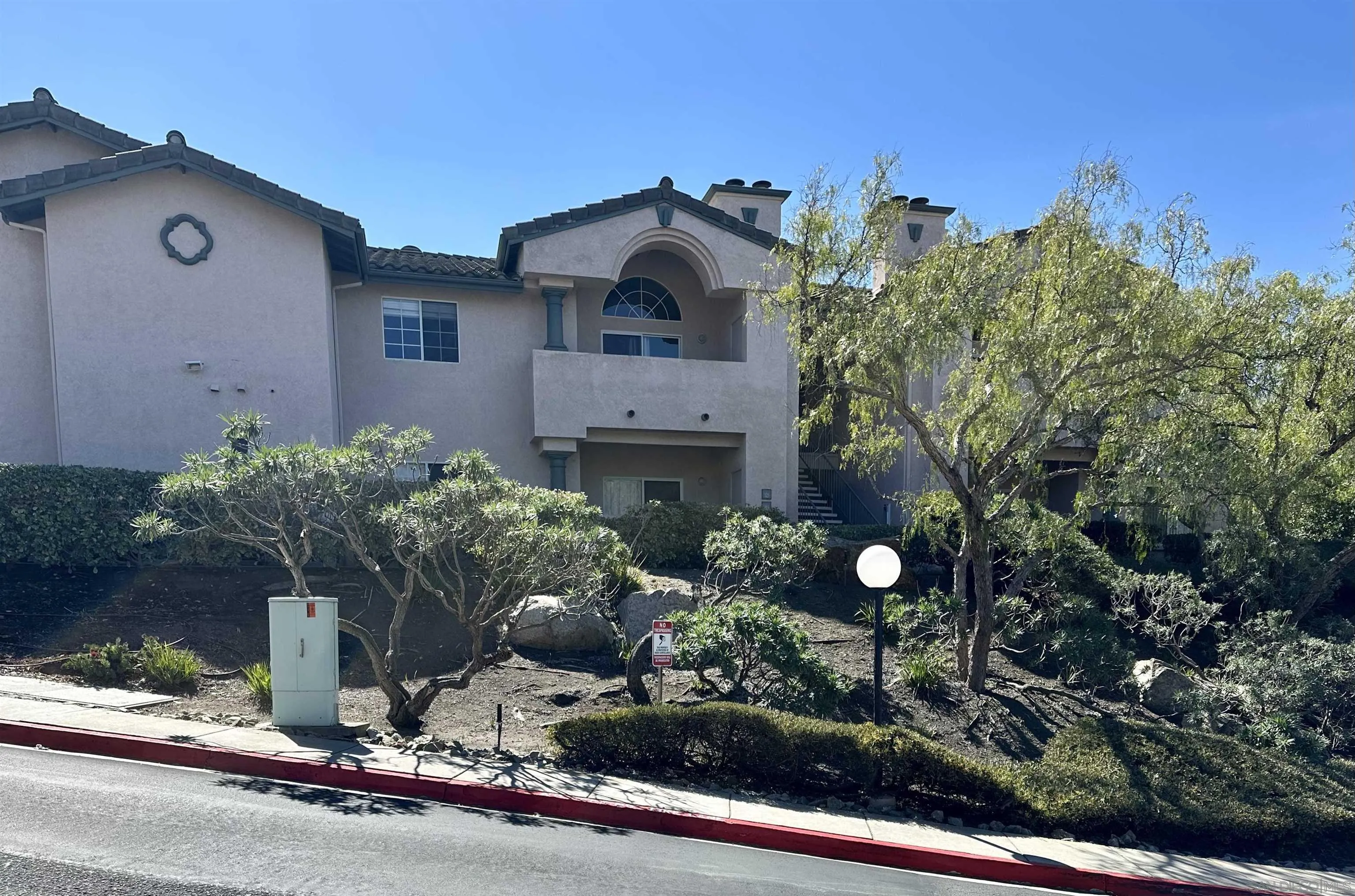 a front view of a house with yard