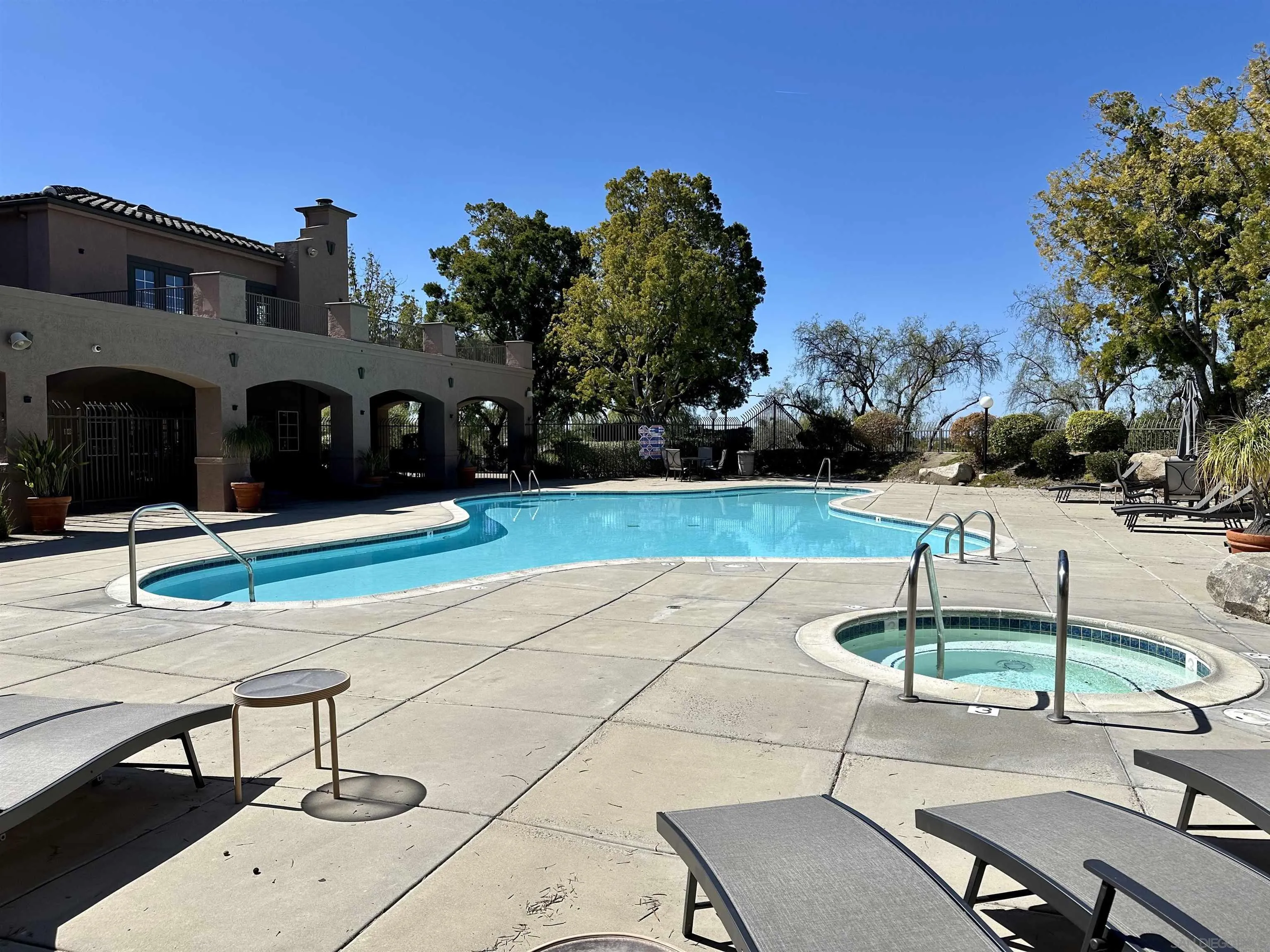 17161 Alva Road, Unit 123 San Diego, CA 92127 - Photo 25 of 30 a view of a chairs and tables in the patio