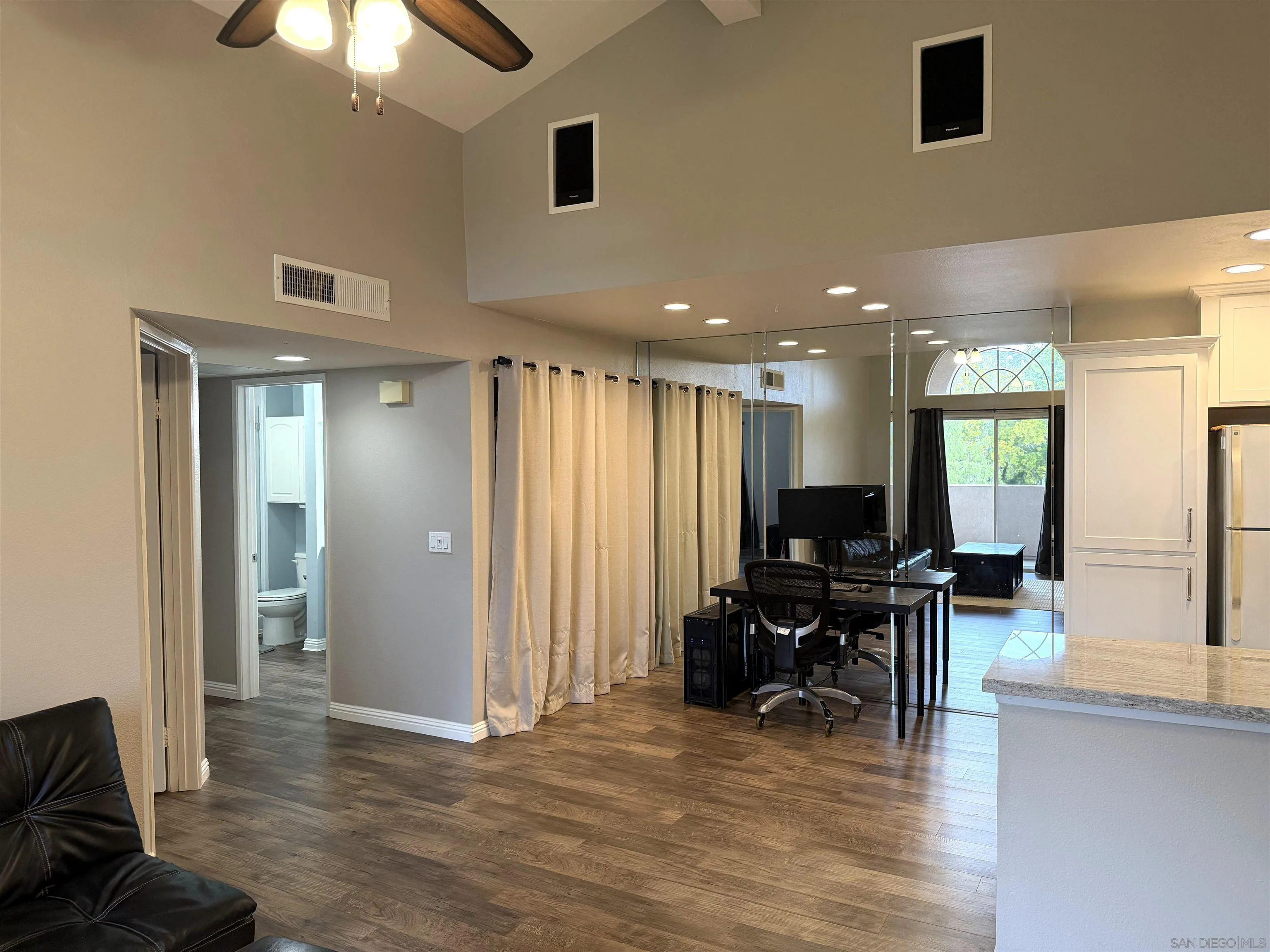 17161 Alva Road, Unit 123 San Diego, CA 92127 - Photo 10 of 30 a view of kitchen with furniture and wooden floor