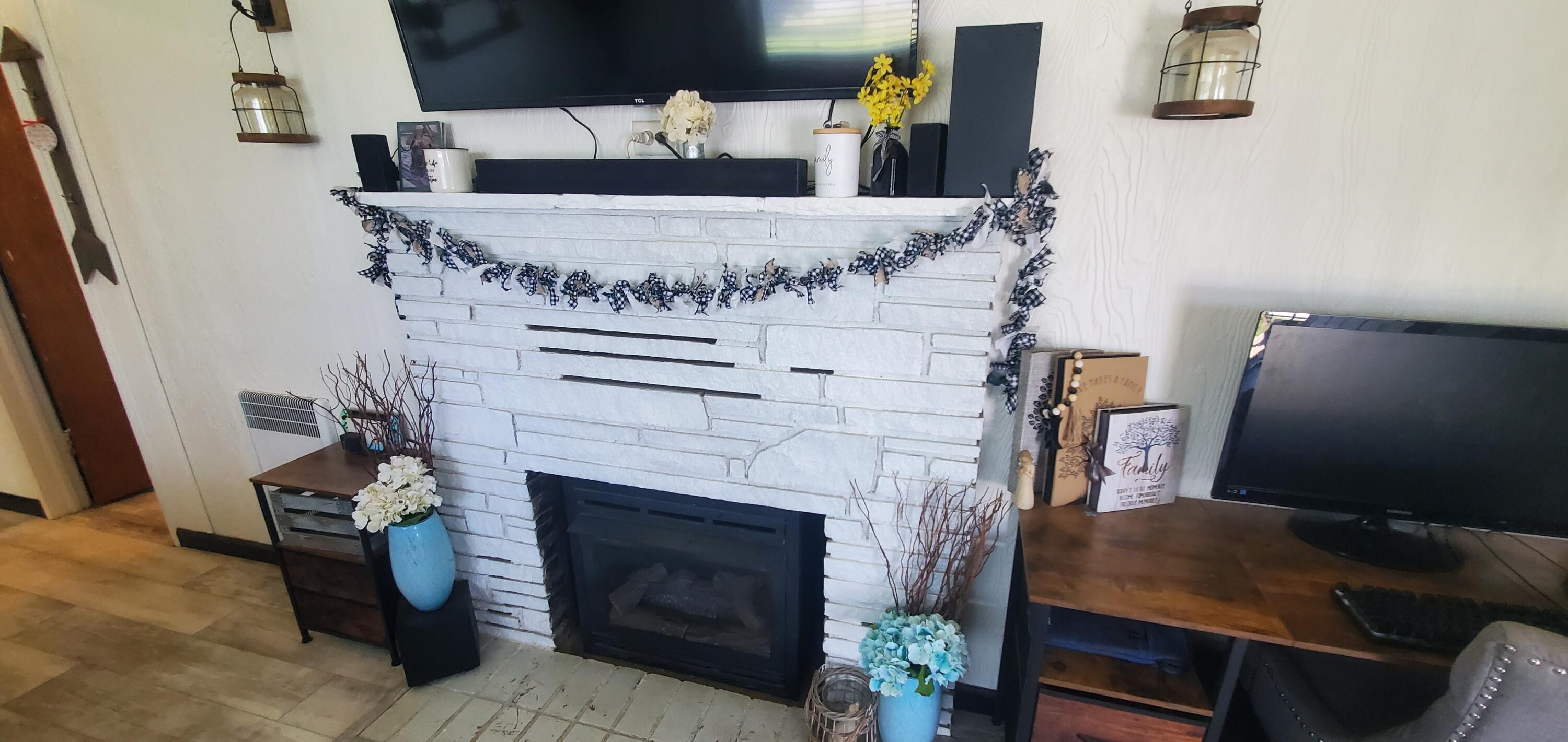 19368 Lucille Street Anderson, CA 96007 - Photo 11 of 13 a living room with furniture and a fireplace