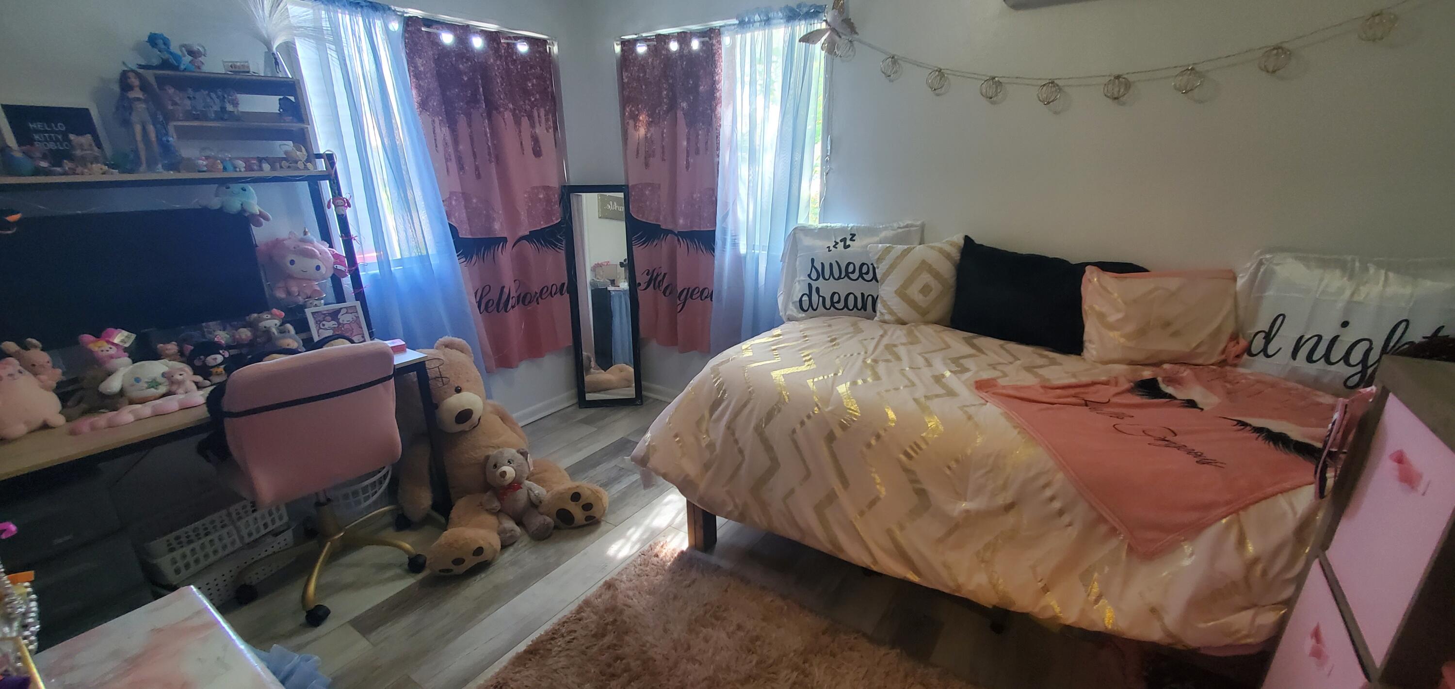 19368 Lucille Street Anderson, CA 96007 - Photo 3 of 13 a bed sitting in a bedroom next to a window and chair