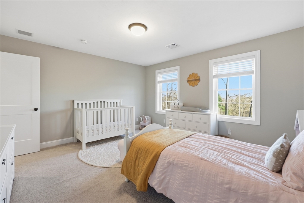 103 Rice Corner Road Brookfield, MA 01506 - Photo 27 of 39 a bedroom with a bed and a window