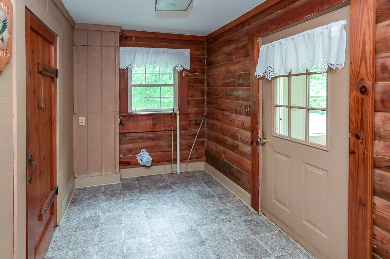 855 Hickory Drive Pulaski, TN 38478 - Photo 14 of 57 a view of an empty room with wooden floor and windows