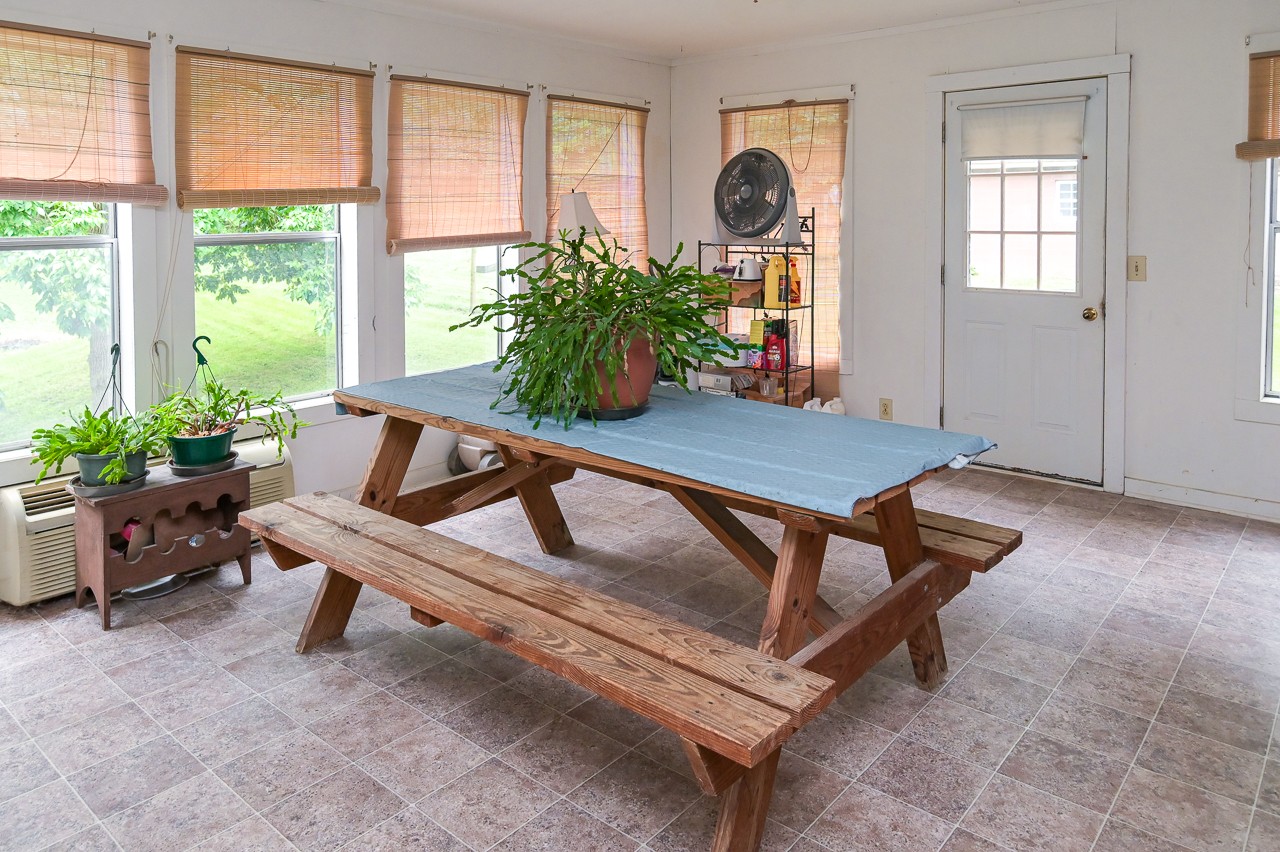 855 Hickory Drive Pulaski, TN 38478 - Photo 18 of 57 a living room with furniture and a potted plant