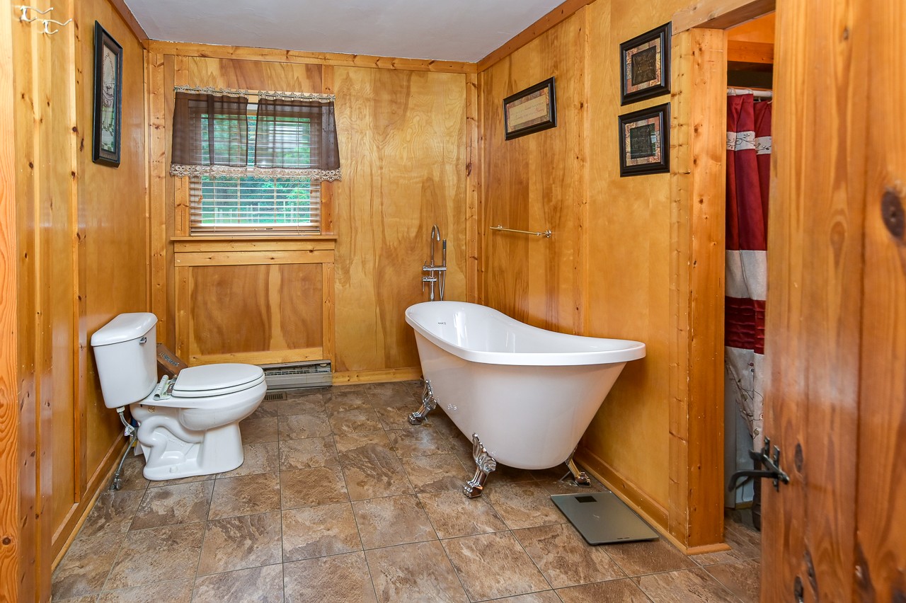 855 Hickory Drive Pulaski, TN 38478 - Photo 23 of 57 a bathroom with a toilet sink and shower