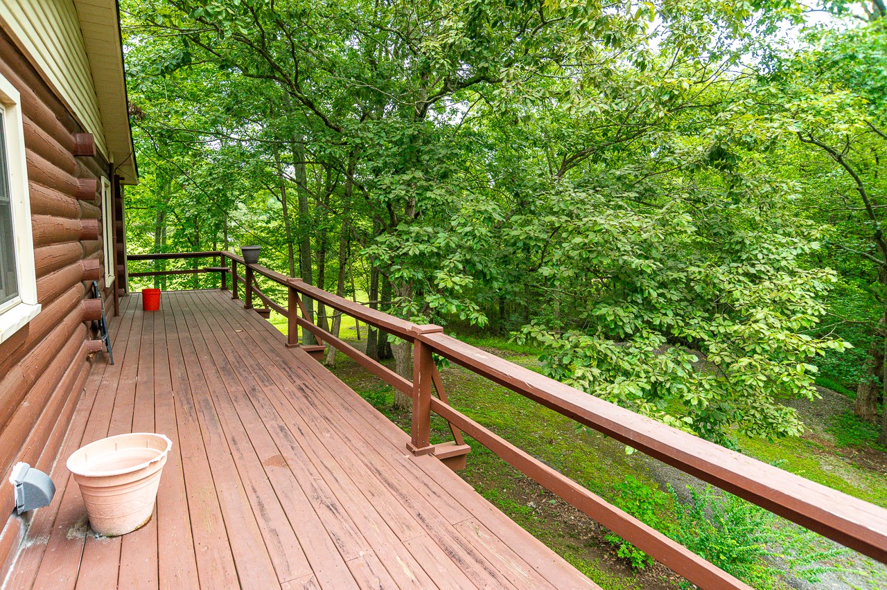 855 Hickory Drive Pulaski, TN 38478 - Photo 5 of 57 a view of balcony with wooden floor and fence