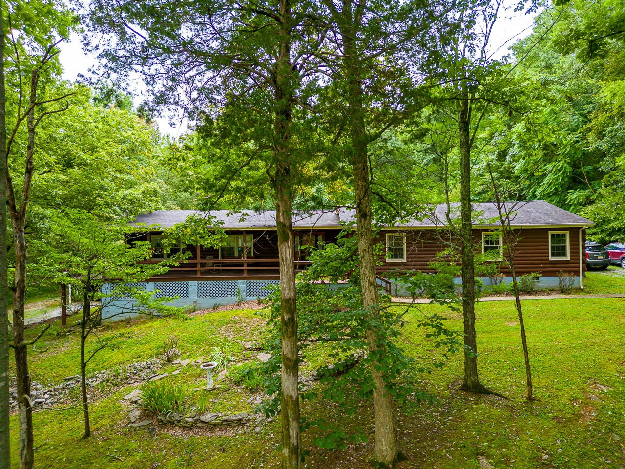855 Hickory Drive Pulaski, TN 38478 - Photo 56 of 57 a backyard of a house with lots of green space