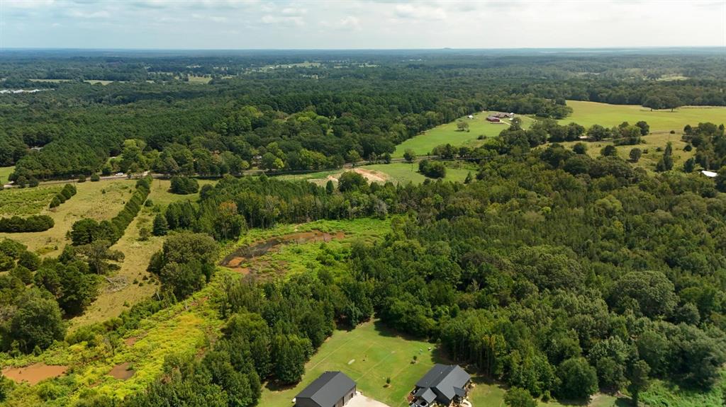 Lot 2 Fm 757 Winona, TX 75792 - Photo 8 of 25 an aerial view of a houses with a yard