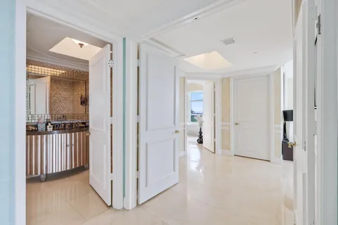 a bathroom with a large tub and shower