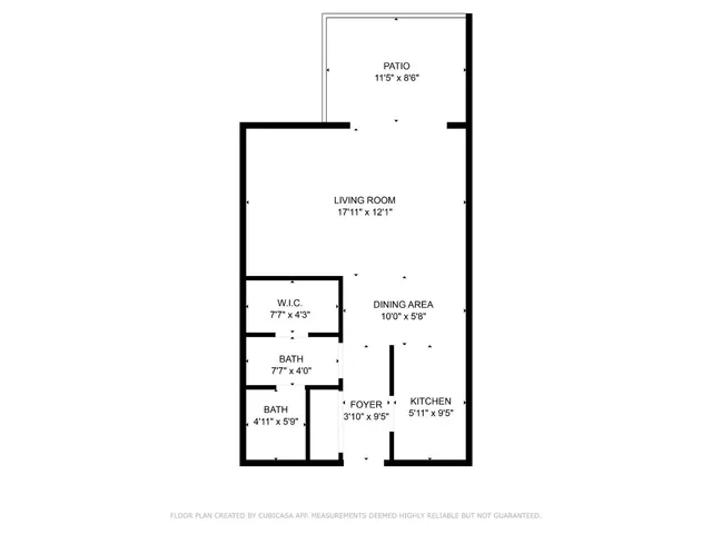 a picture of a bench in front of a wall