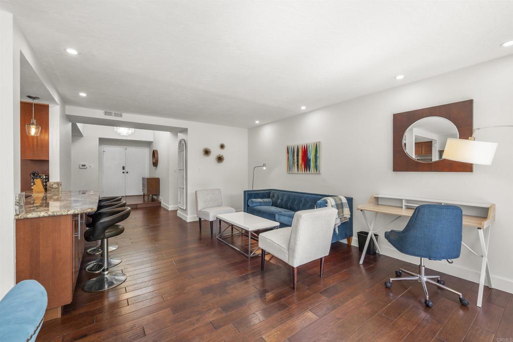 3099 Driscoll Drive San Diego, CA 92117 - Photo 11 of 41 a living room with furniture and a wooden floor