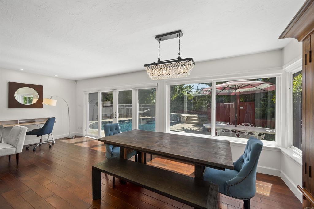 3099 Driscoll Drive San Diego, CA 92117 - Photo 15 of 41 a view of a dining room with furniture window and outside view