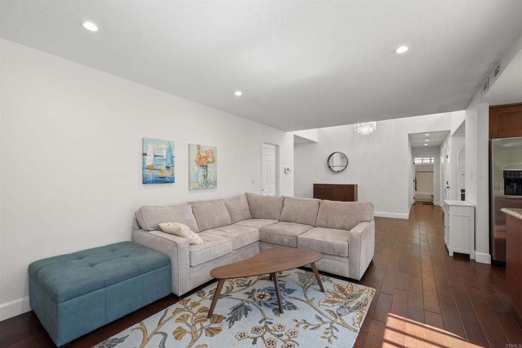 3099 Driscoll Drive San Diego, CA 92117 - Photo 24 of 41 a living room with furniture and a couch