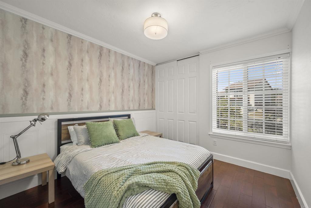 3099 Driscoll Drive San Diego, CA 92117 - Photo 29 of 41 a bedroom with a bed and a window