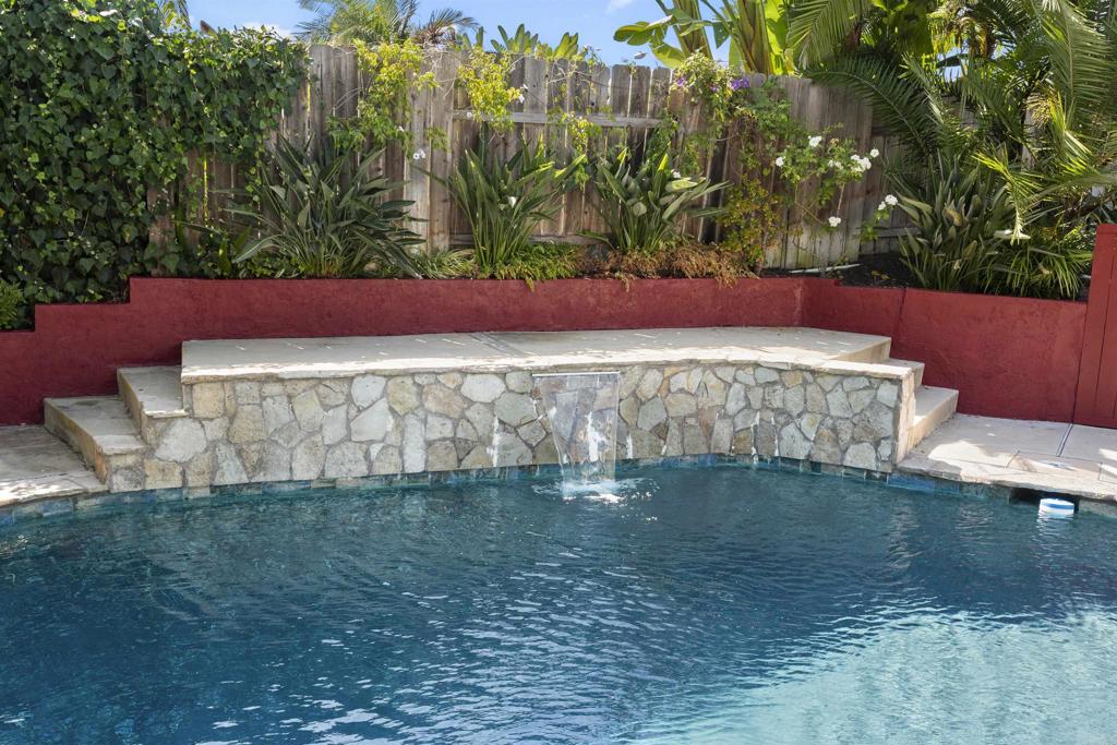 3099 Driscoll Drive San Diego, CA 92117 - Photo 34 of 41 a view of a yard with an outdoor space