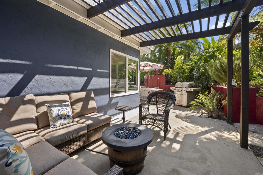 3099 Driscoll Drive San Diego, CA 92117 - Photo 38 of 41 a view of a patio with a table chairs and a potted plants