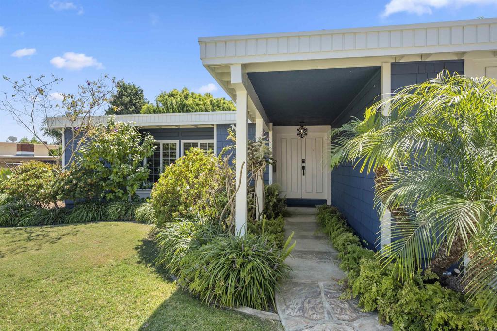 3099 Driscoll Drive San Diego, CA 92117 - Photo 4 of 41 a view of house with garden