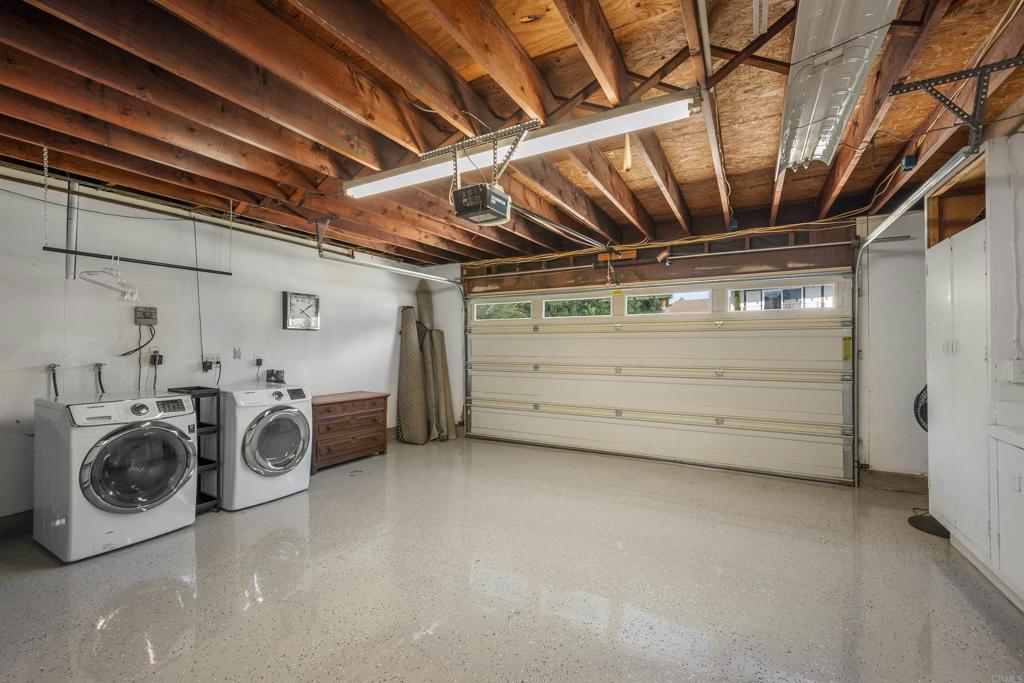 3099 Driscoll Drive San Diego, CA 92117 - Photo 41 of 41 a utility room with dryer and washer