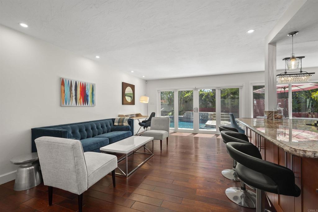 3099 Driscoll Drive San Diego, CA 92117 - Photo 8 of 41 a living room with furniture and a large window