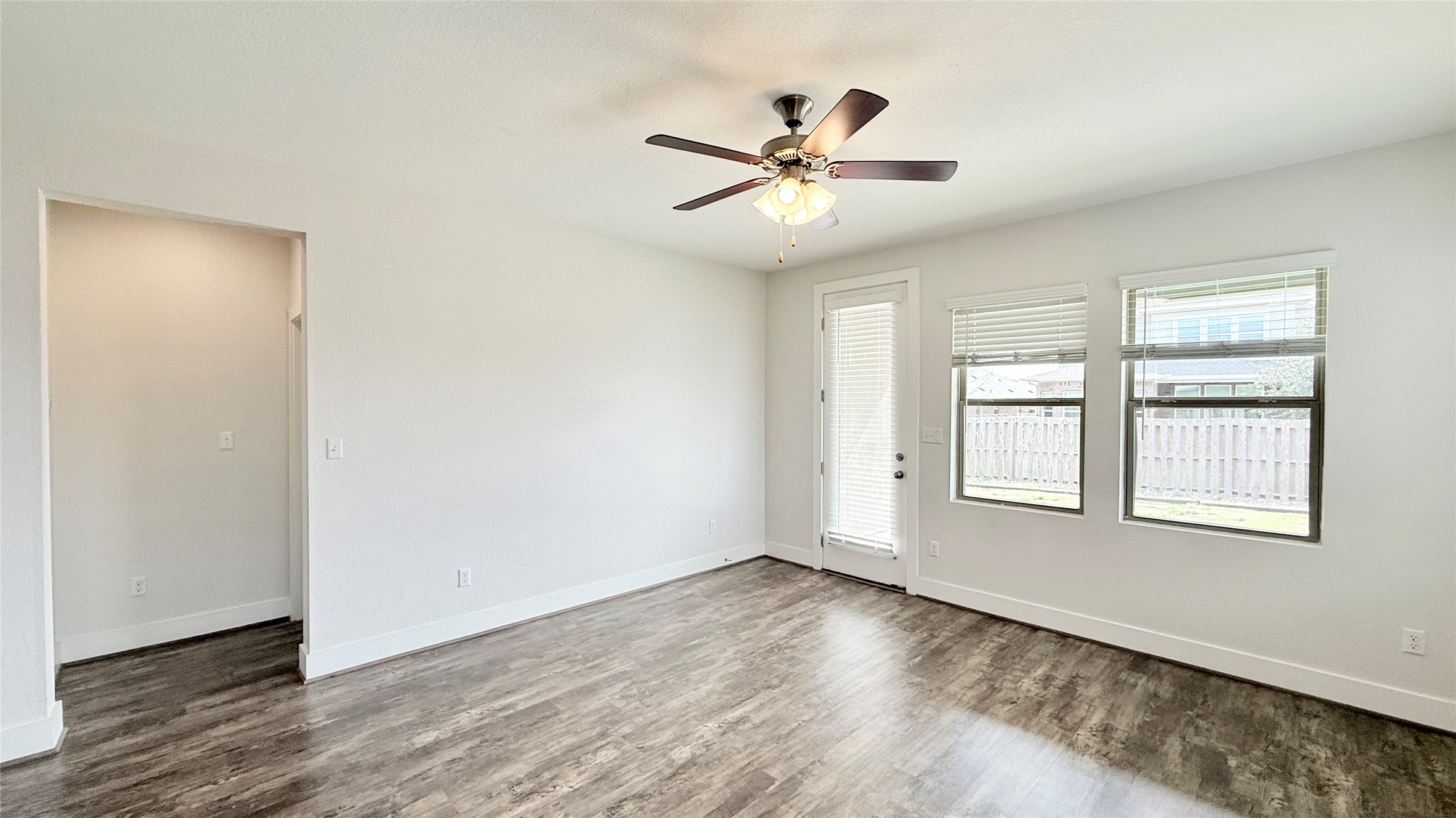 600 Golden Glory Road Leander, TX 78641 - Photo 6 of 21 Spare room with a ceiling fan and dark wood-style flooring